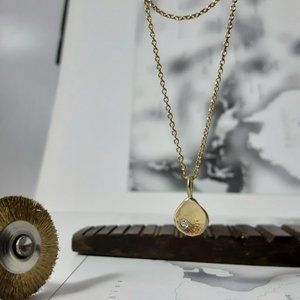 Gold diamond necklace.